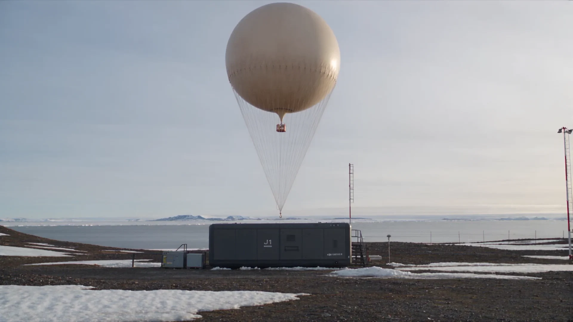 Balloon and J1 ground enclosure in a tundra setting